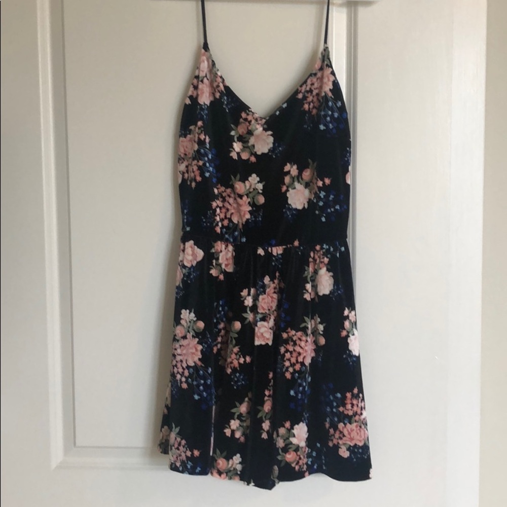 Black velvet romper with floral print
